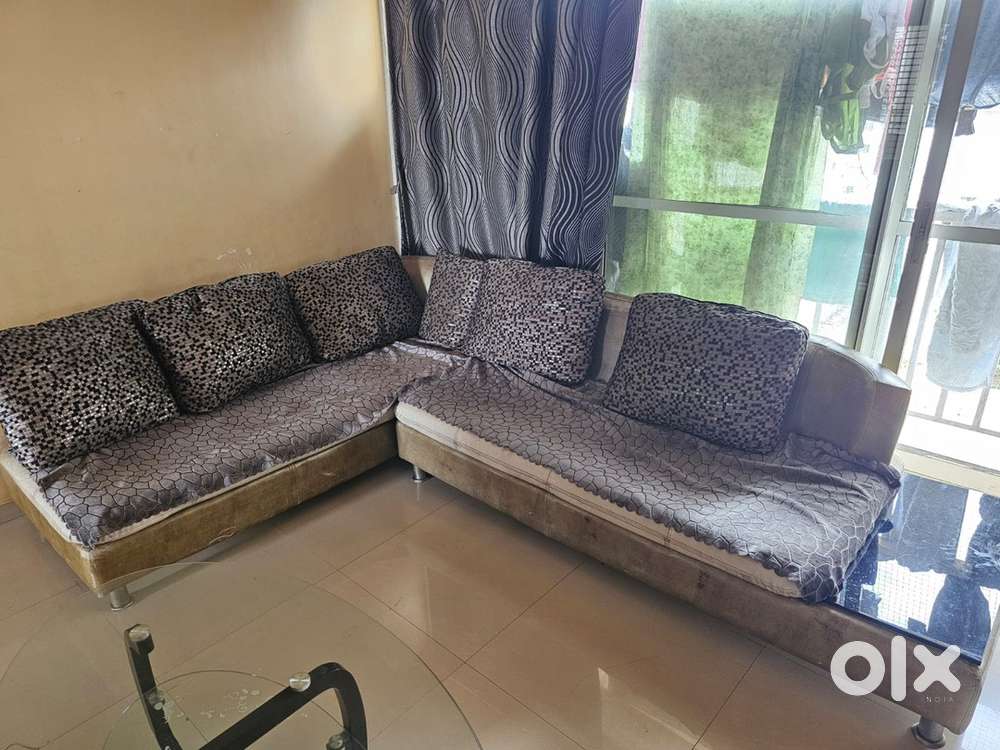 L shape sofa set + centre table + dining table + cupboard