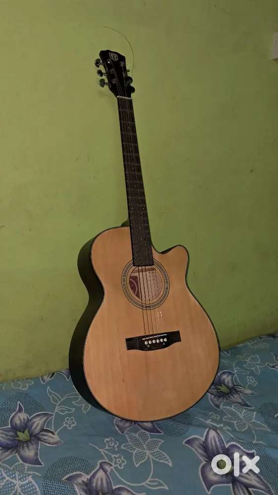 Warm, Rich sound- gently used acoustic guitar for sale