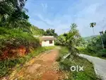 30 cent Road side plot with Newly constructed house near Vagamon