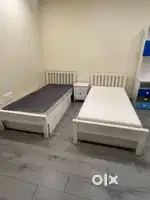 2 Single beds with mattress and storage drawers