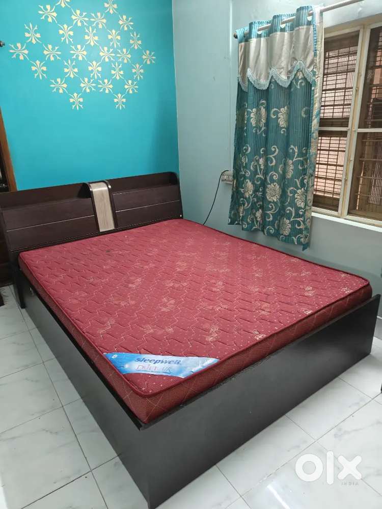 Queen size bed with storage capacity