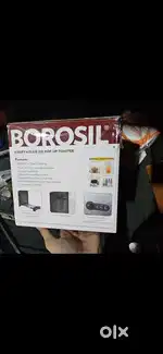 A new toaster unused  4 sides