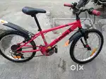 Two btwin cycles one with gear and one normal