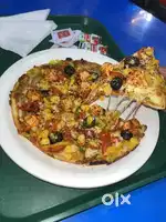 Kitchen assistant require for Pizza Shop.