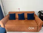 Sofa cum bed with two puffies
