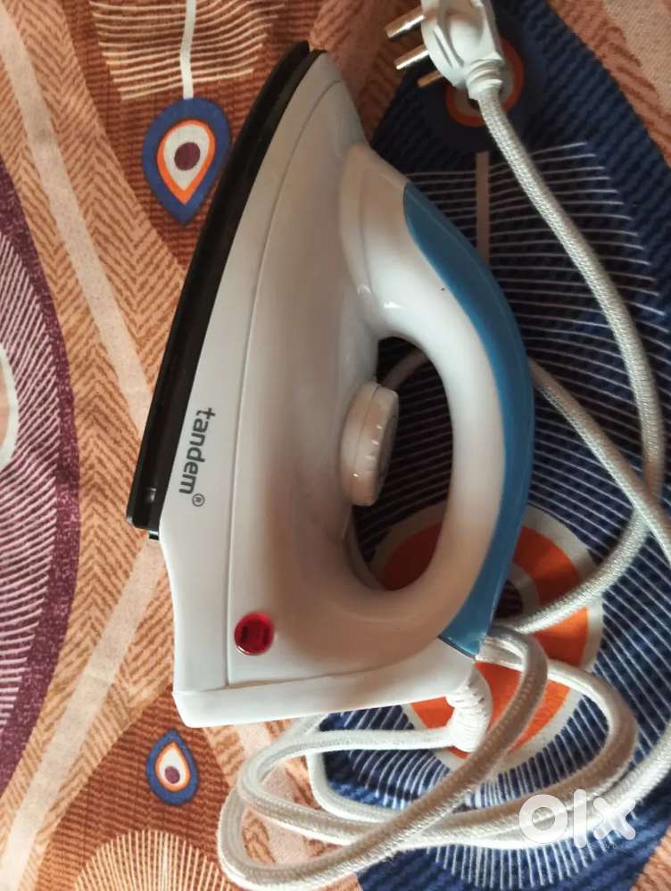 Electric Dry Iron press for sale. Excellent condition. Not much used.