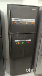 Samsung double door fridge good condition with warranty 1 year old