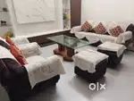 A 7 seated sofa with table