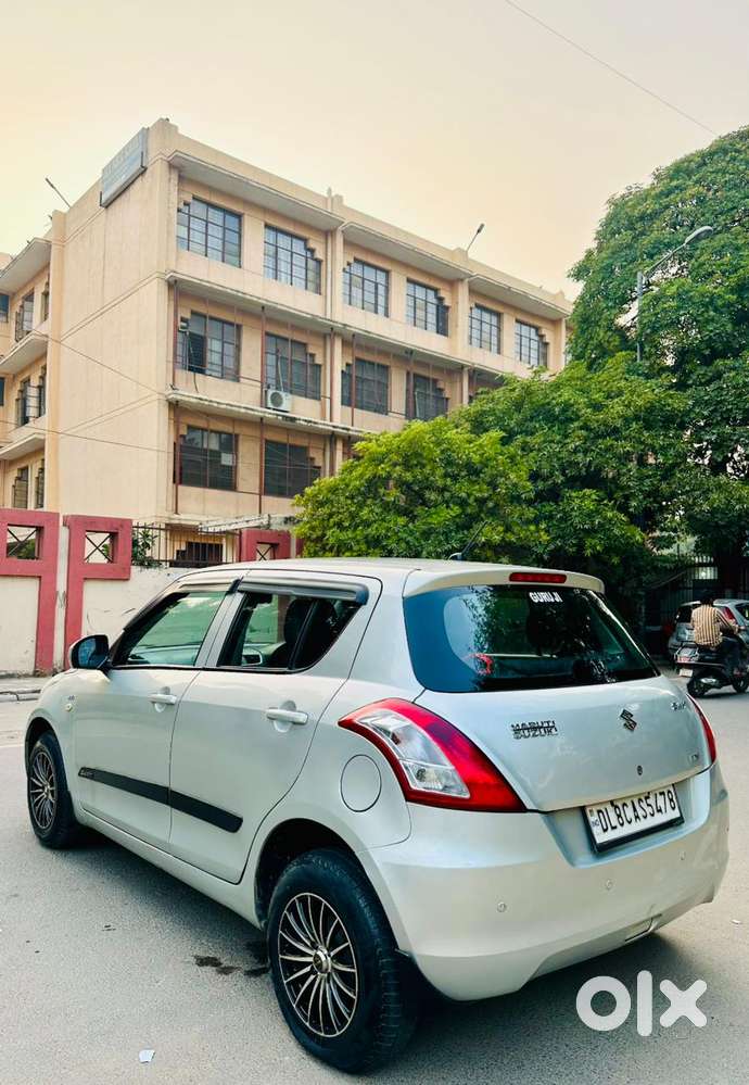 Maruti Suzuki Swift LXI Optional-O, 2017, Petrol