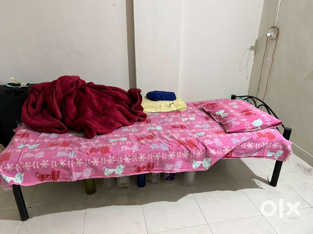 Urgent sell Metal Cot with 2 matress