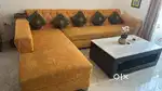 L shape sofa with centre table