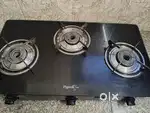 Pigeon 3 burner gas stove and Preeti blue leaf mixer grinder