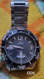 Escort wrist watch with date and time