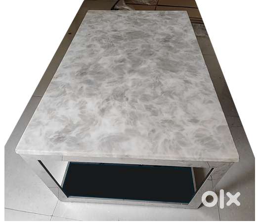 Marble top center table with steel frame and tampered glass bottom