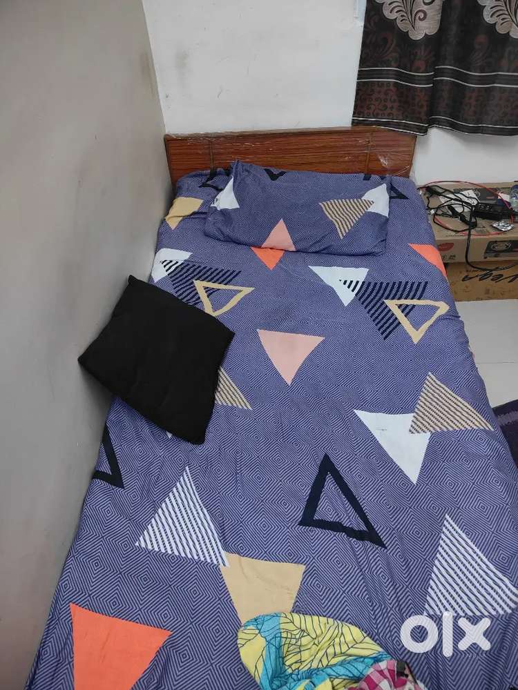 Single wooden bed,  Table