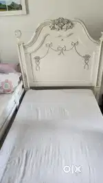 Selling very sturdy, princess cot and night stand in white