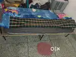 A wooden folding and book shelf