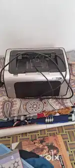 HP Laserjet pro P 1108 plus with cartridge with paper (one year old)