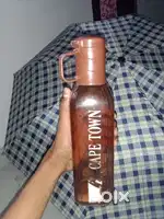 Water bottle with time allowed., and also a brown bottle