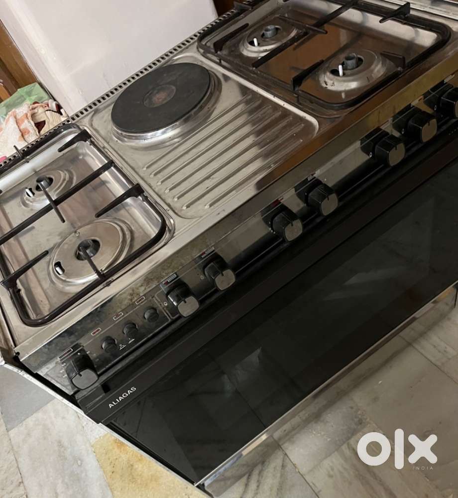 GAS & ELECTRIC OVEN WITH 4 GAS & 1 ELECTRIC BURNER FOR SALE
