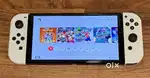 Nintendo Switch OLED Bundle – Console, 10 Games + Case, used