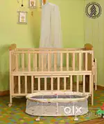BabyHug wooden cot (with detachable bassinet, mattress & mosquito net)