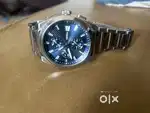 fossil blue dial steel strap watch