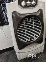 A Crompton cooler is available for sale with stand