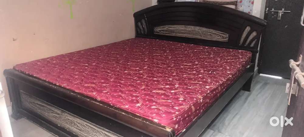 Newly King size bed with Mattress for sale.