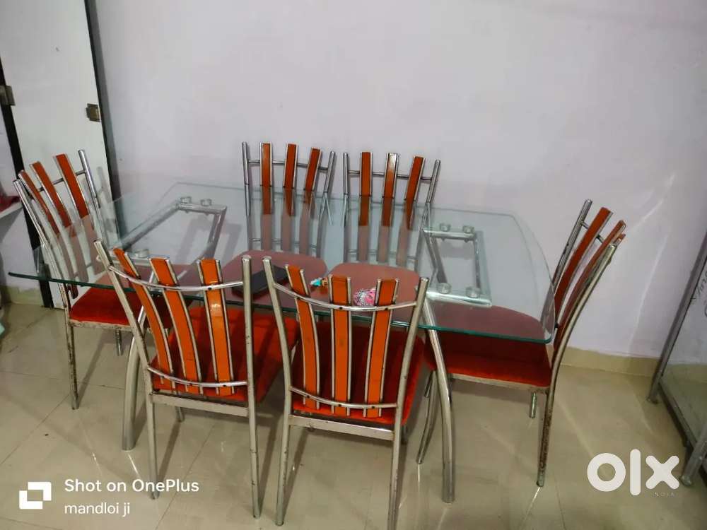 Glass top dining table