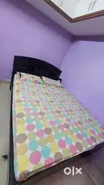 King sized bed, and a Mattress