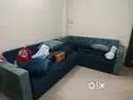 L type Sofa cum bed unit with back rest pillows