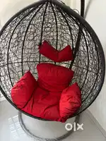 Single seater swing chair with stand and cushions