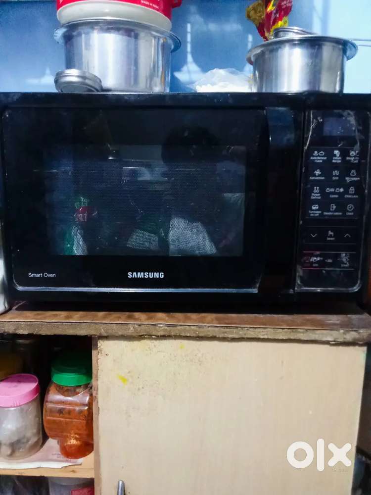 The product in the image is a Samsung Smart Oven. 