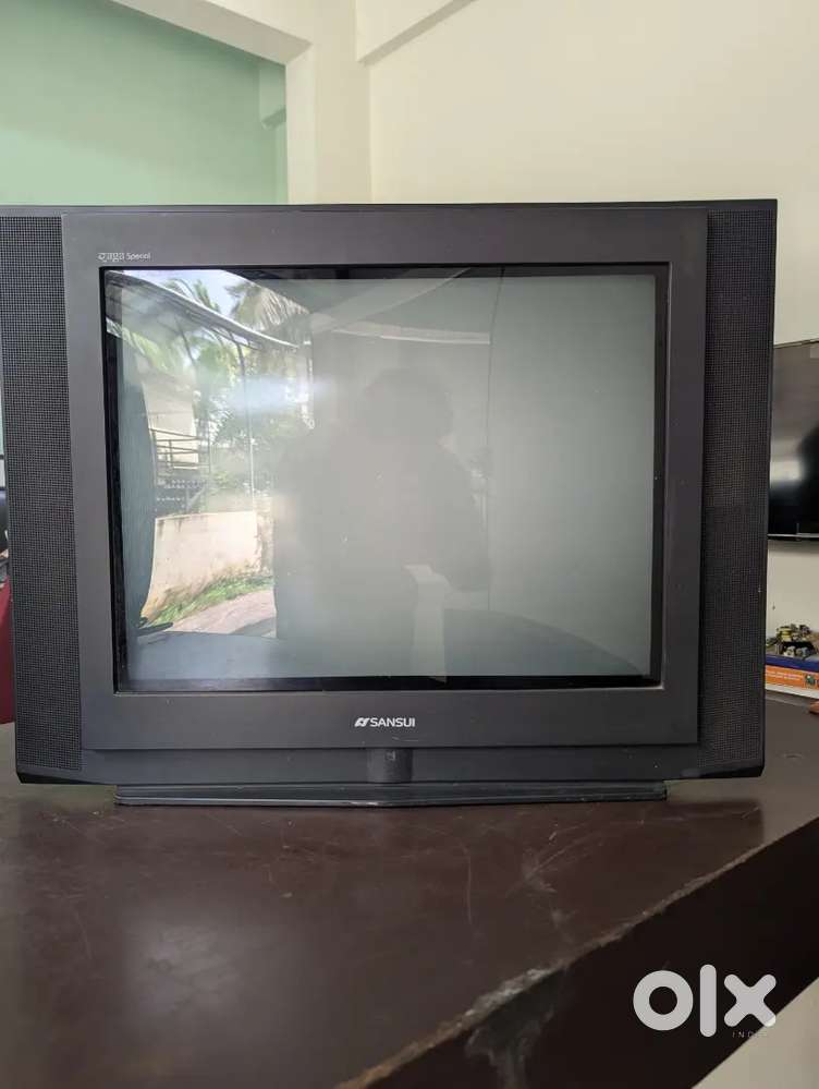 SANSUI TELEVISION AND TV STAND