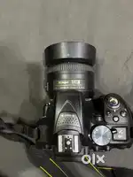 Nikon D5300 with 35 mm Prime Lens with Tripod and Speedlight