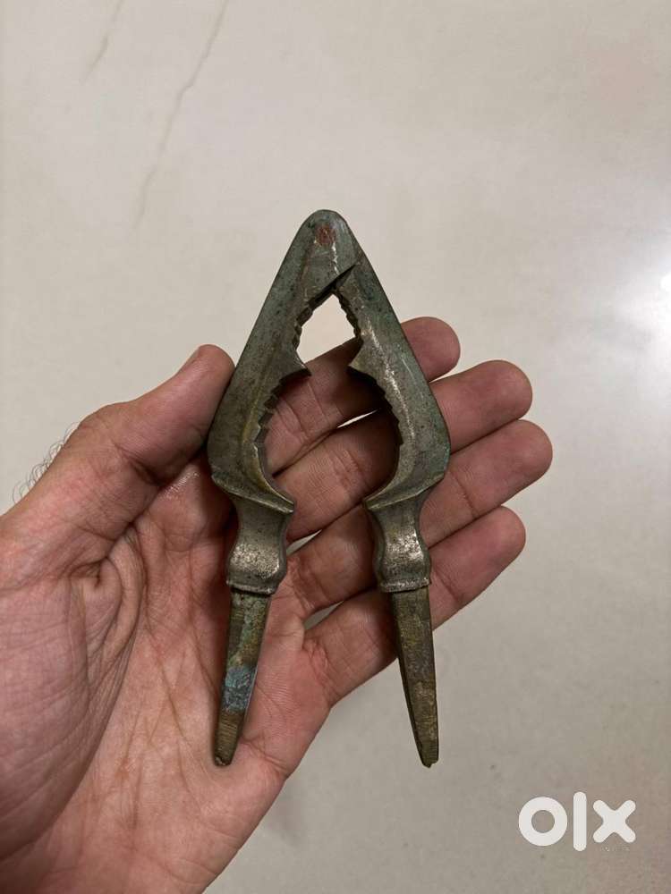 Very old and antique brass unique nut cracker
