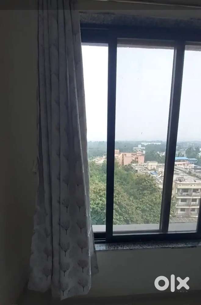 Newly constructed flat with kitchen trolleys,curtains, tubelight & fan