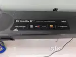 LG SL8YG Soundbar less used with wireless woofer and 2 satellite spk