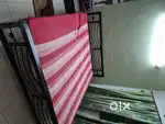 Iron bed with mattress