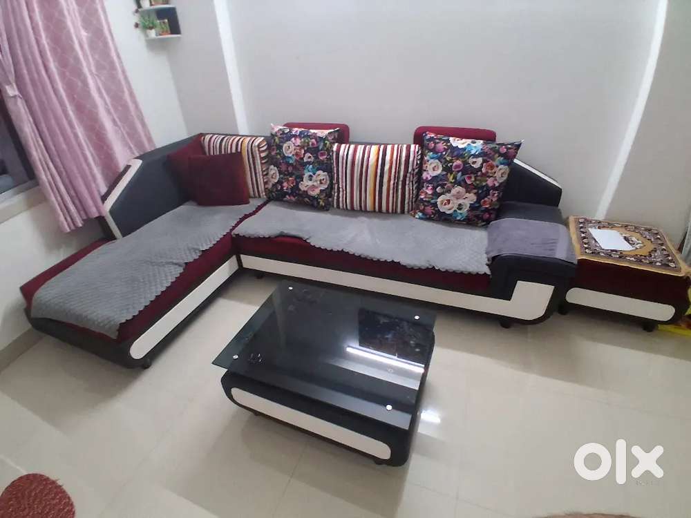 L type sofa with center table