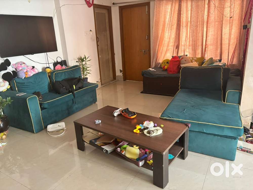 6 seater storage sofa cum bed along with storage single bed and table