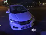 Only 27,000 KM driven extremely well maintained Honda City Pearl White