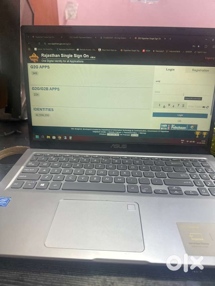 on desk computer emitra work