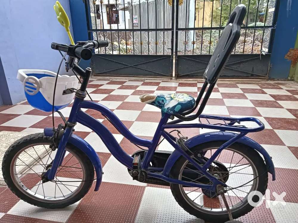 Small boy girl cycle