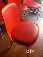 Red padded restaurant chair - good condition