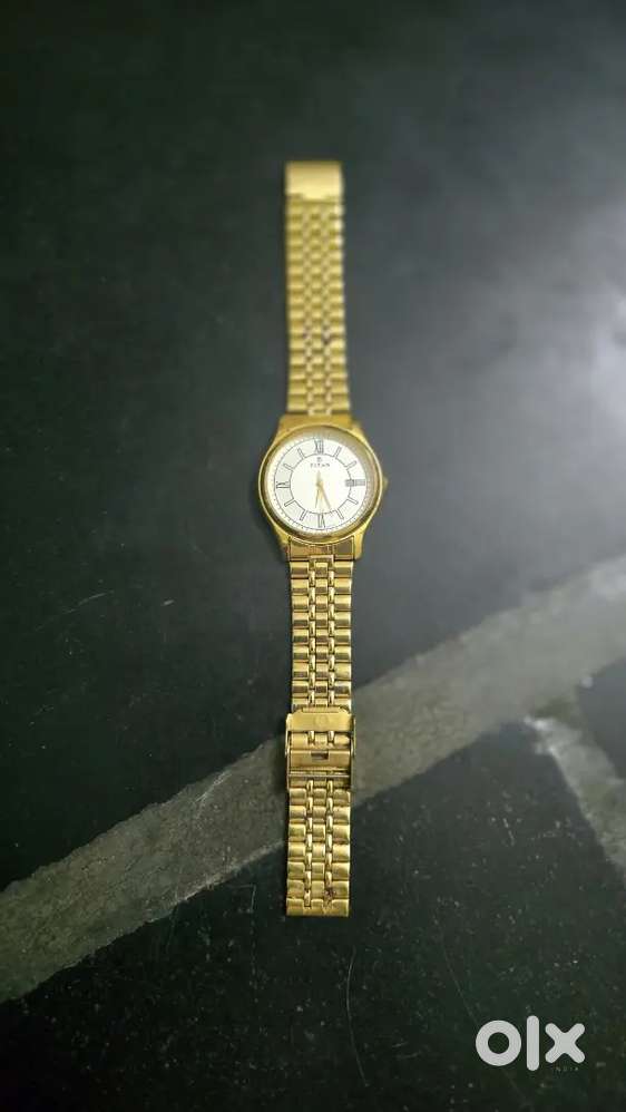 Tital gold watch