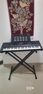 Kurzweil KP110 keyboard for sale with stand. Price negotiable