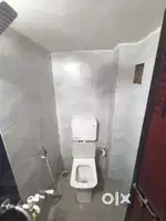 Single room with attached bathroom.