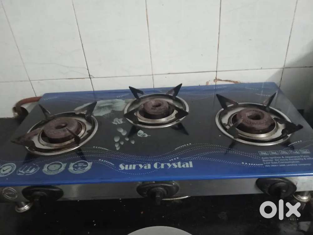 Surya crystal automatic Gas stove 3 burnal in good condition.fixh.hi
